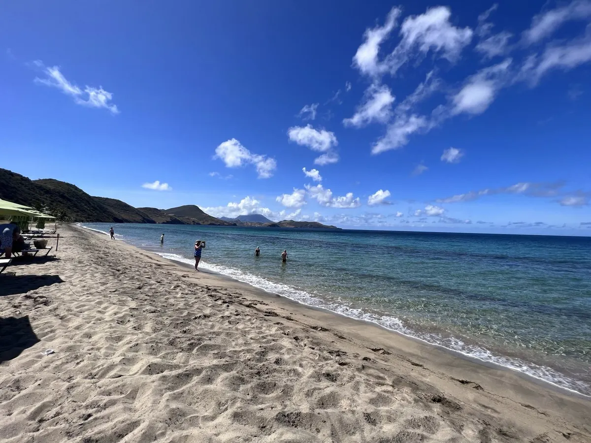 Turquoise beach water and soft shoreline