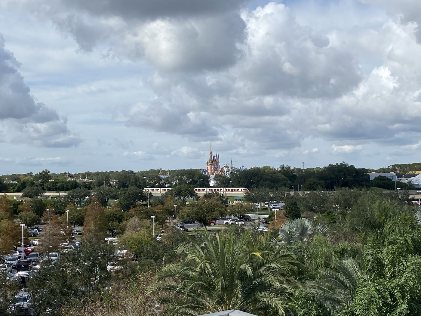 Cinderella Castle with monorail and dramatic sky