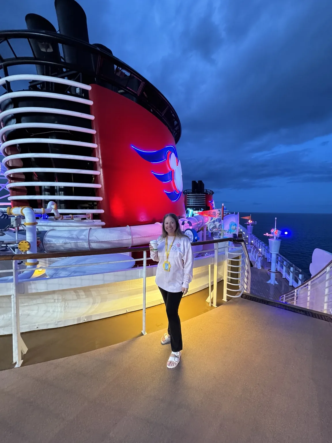 Amber on a cruise deck at dusk